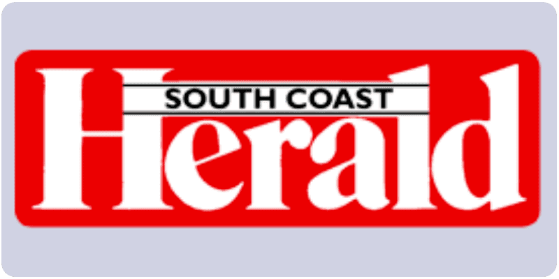 Logo of The South Coast Herald, a leader in local news that has published multiple articles about The Headache Clinic.